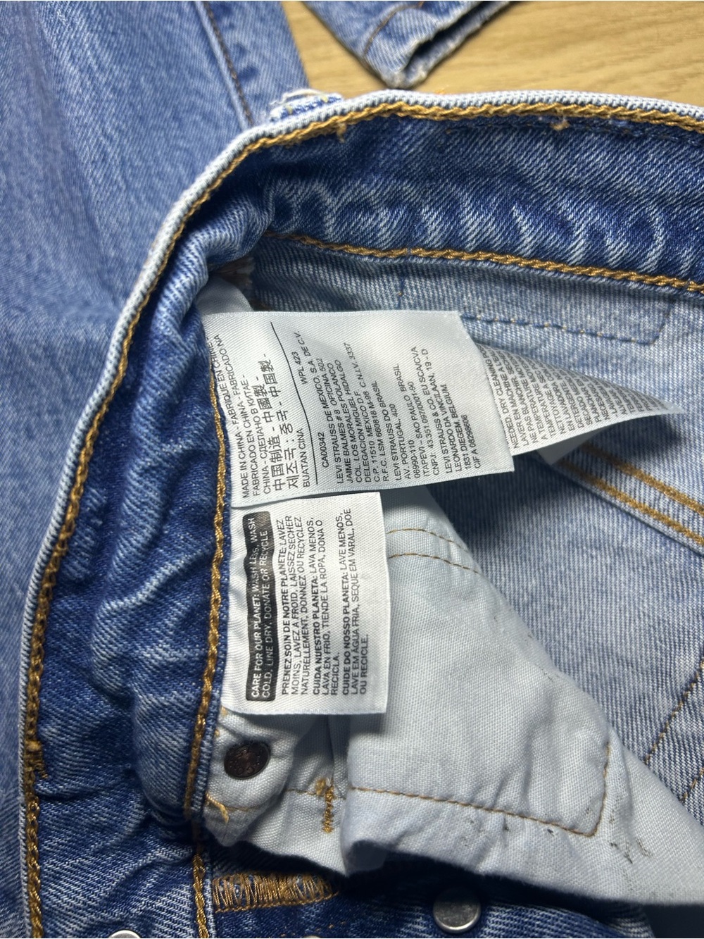 Levi's Women's Straight Leg Jeans in Light Blue Distressed Denim - Picture 5 of 8